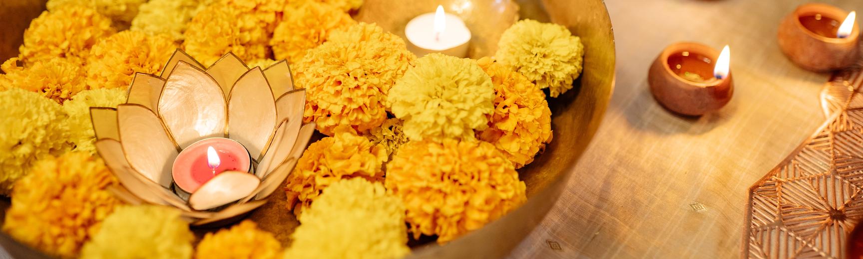 Diwali lights in a bowl coloured yellow.