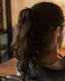 a woman studying at a laptop