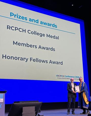 Prof Sir Andrew Pollard receiving his Honorary Fellowship Award